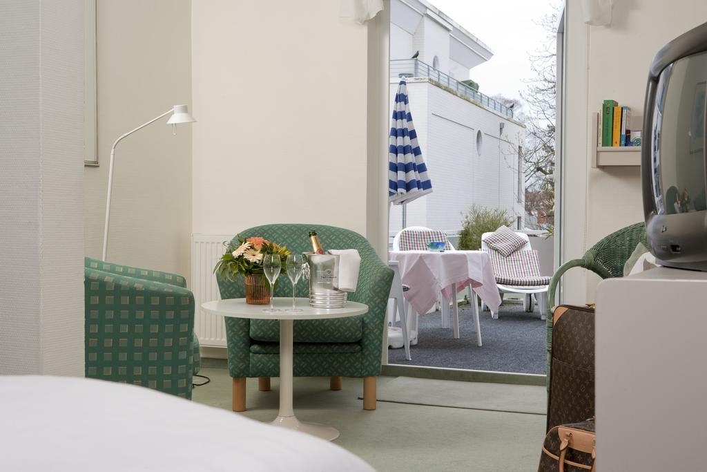 Hotel Parkfrieden Тіммендорфер-Штранд Номер фото
